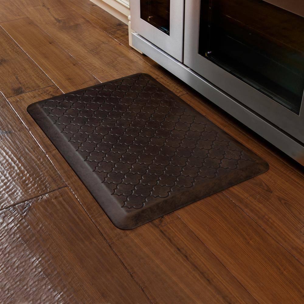 WellnessMats Trellis Antique 3'X2' MT32WMRDB, Antique Dark A floor mat that has smooth surface. An ergo mat that gives comfort and relaxation while working in the kitchen or in any part of the house.